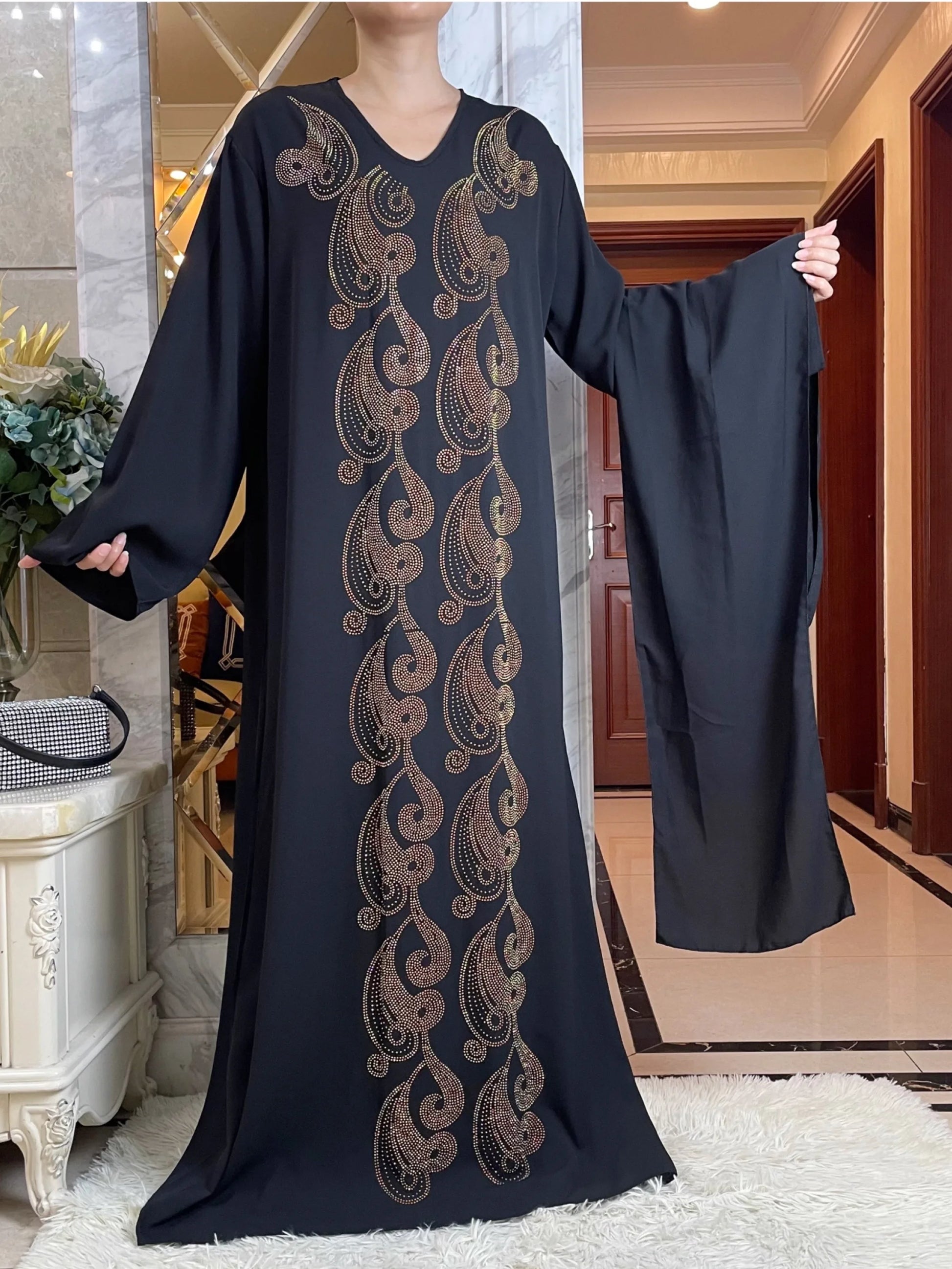 Abaya élégante à capuche pour femme