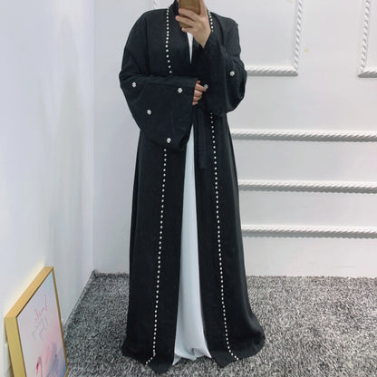 Abaya noire ouverte Dubai perles caftan Turquie fashion femme.